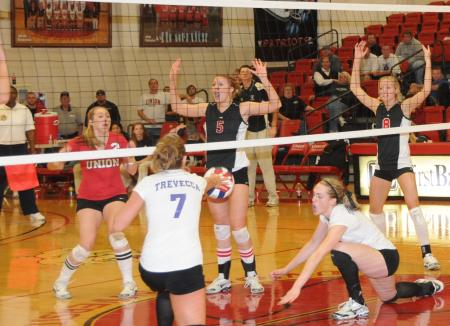 As the ball falls to the floor, Union players begin to celebrate their conference tournament title. - Photo by Morris Abernathy
