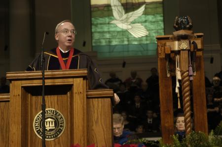 President Dockery welcomes friends and families to the fall graduation ceremony. - Photo by Beth Spain