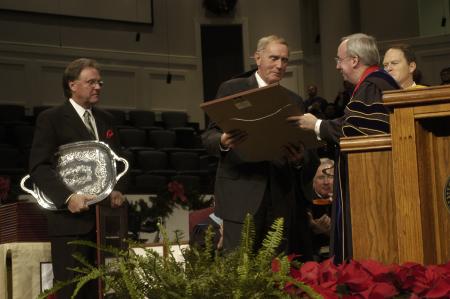 President Dockery honored Jackson Mayor Jerry Gist and Madison County Mayor Jimmy Harris with the Robert E. Craig Service Award during the fall commencement exercises at West Jackson Baptist Church.  - Photo by Beth Spain
