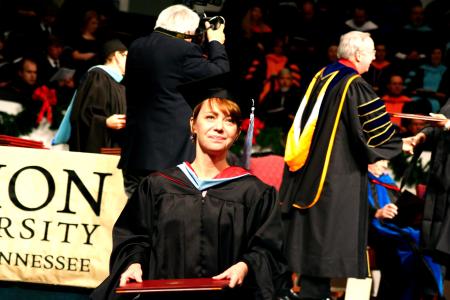 Brittany Elizabeth Camp receives her master of arts in education at the fall graduation ceremony.  - Photo by Kristi McMurry Woody