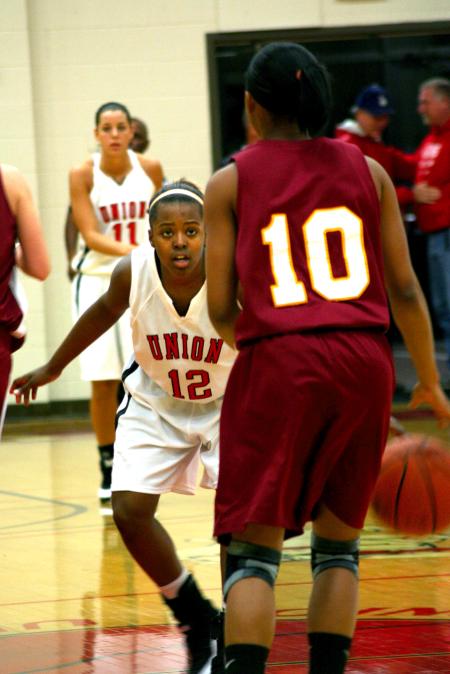 Christina Ray, freshman, guards against her opponent during the Rotary Classic held at Union.  - Photo by Kristi McMurry Woody