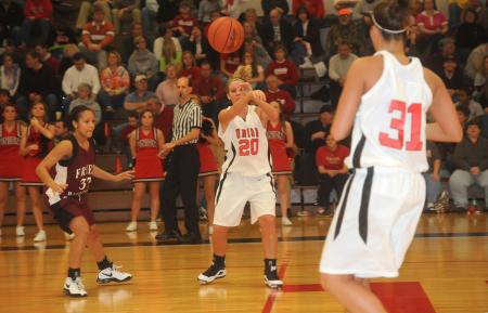 Kayla Hudson (20) makes a pass to teammate Merideth Jacobs (31) in the Lady Bulldog's win over Freed-Hardeman (Tenn.). - Photo by Morris Abernathy