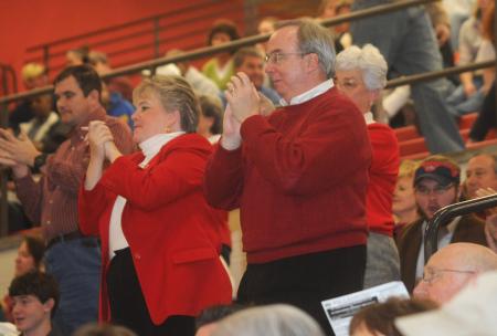 Union President, Dr. David S. Dockery and Mrs. Dockery, cheer on Union's basketball teams. - Photo by Morris Abernathy
