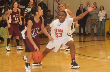 Freshman guard Lavanda Ross (53) plays defense in the Lady Bulldog's 79-50 win over Freed-Hardeman (Tenn.). - Photo by Morris Abernathy