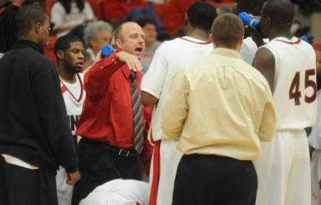 Union head coach Ralph Turner instructs his players during a time out. - Photo by Morris Abernathy