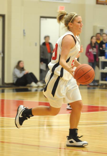 Sophomore guard Kayla Hudson brings the ball down the floor. - Photo by Morris Abernathy