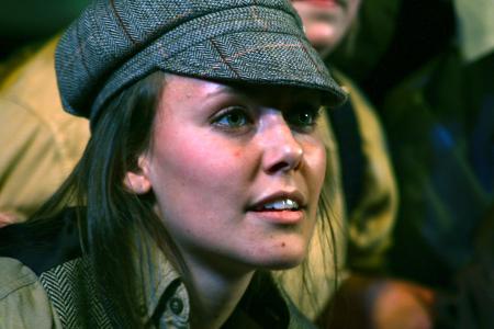 Leah Heinsch, junior political science major, performs with her group in a skit about the Newsies during the SAC Variety Show. - Photo by Kristi McMurry Woody