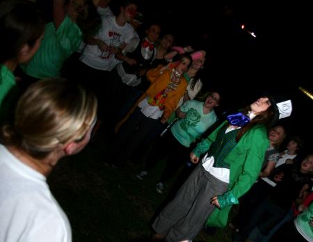 The ladies of Zeta Tau Alpha celebrate after winning several awards for their Alice in Wonderland skit at the SAC Variety Show. - Photo by Kristi McMurry Woody