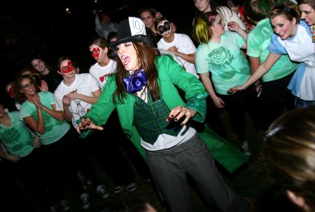 The ladies of Zeta Tau Alpha celebrate after winning several awards for their Alice in Wonderland skit at the SAC Variety Show. - Photo by Kristi McMurry Woody
