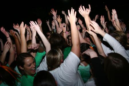 The ladies of Zeta Tau Alpha celebrate after winning several awards for their Alice in Wonderland skit at the SAC Variety Show. - Photo by Kristi McMurry Woody