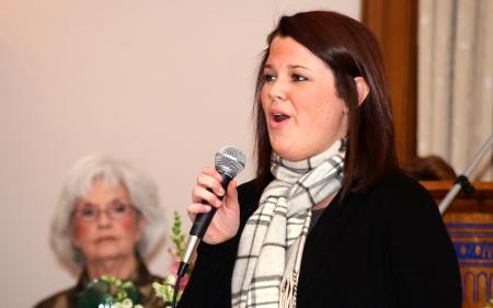 Anna Choate, sophomore music major, performs at the Altrusa Woman of the Year ceremony honoring Mary Anne Poe. - Photo by Kristi McMurry Woody