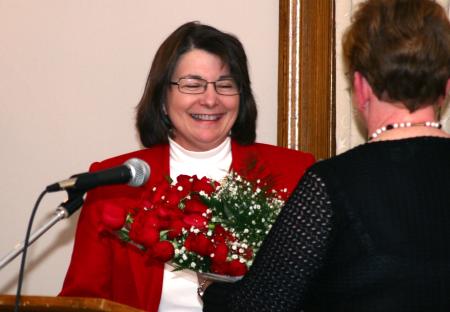 Mary Ann Poe, social work chair, reacts to the news that she was named Altrusa International Club's Woman of the Year. - Photo by Kristi McMurry Woody