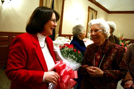 Mary Ann Poe, social work chair, fellowships with Altrusa members after receiving the honor of being named Altrusa International Club's Woman of the Year. - Photo by Kristi McMurry Woody