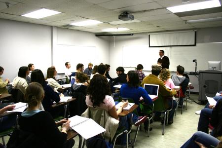 Keith Bates, assistant professor of history, teaches to a room full of students during the Spring 2009 semester. - Photo by Kristi McMurry Woody