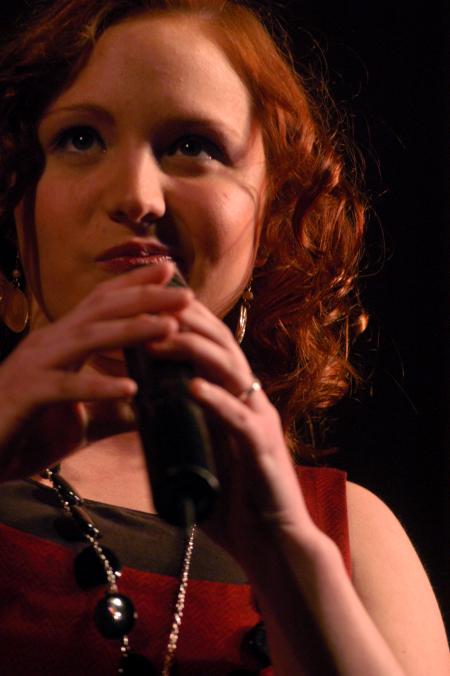 Anna Laarz, junior music education major, performs in the SAC Variety Show. - Photo by Angela Abbamonte