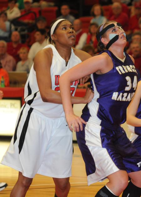 Ashley Lillard prepares to make a rebound during the TranSouth Tournament Championship. - Photo by Morris Abernathy