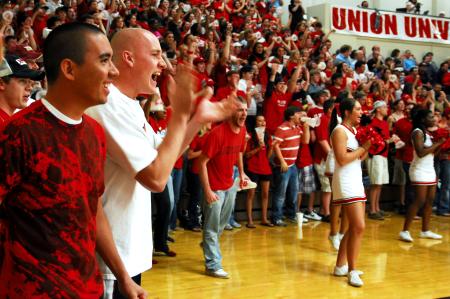 Fans cheer for Union at the TranSouth Conference Tournament Finals against Freed-Hardeman. Students were instructed to wear red for a 'red out.' - Photo by Kristi McMurry Woody