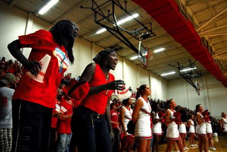 Zeinab Chan and Lavanda Ross lead the cheers for the Bulldogs at the TranSouth Conference Tournament Finals against Freed-Hardeman. - Photo by Kristi McMurry Woody