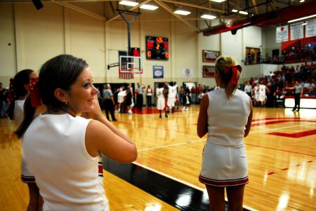 Alicia Holloway looks back at the crowd as they cheer for the 100th point scored in the TranSouth Conference Tournament Finals against Freed-Hardeman. - Photo by Kristi McMurry Woody