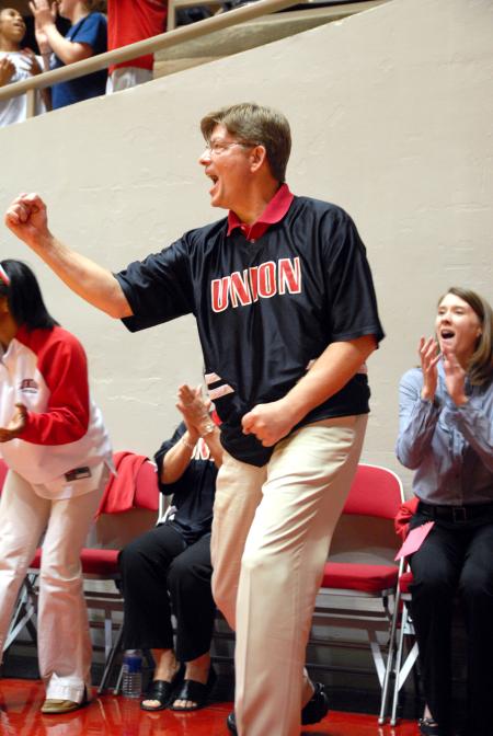 Honorary Coach Gary Grisham cheers from the sidelines as the Lady Bulldogs score in the 2009 NAIA championship. - Photo by Kristi McMurry Woody