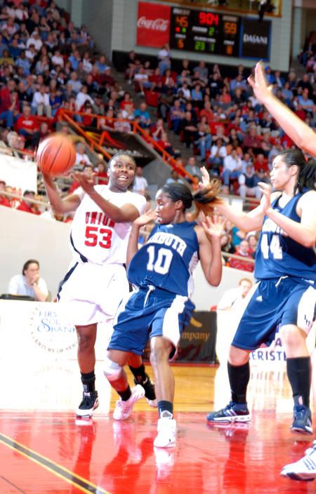 Lavanda Ross drives the ball down the baseline during the championship of the 2009 NAIA tournament. - Photo by Kristi McMurry Woody