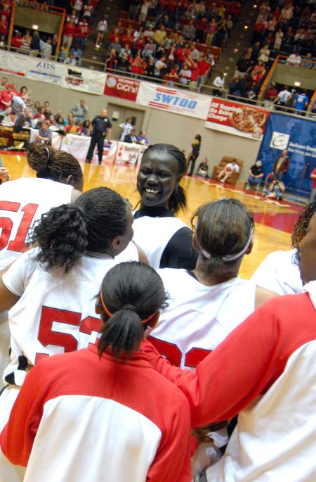 Zeinab Chan celebrates with her teammates after the Lady Bulldogs win the 2009 NAIA championship. - Photo by Kristi McMurry Woody