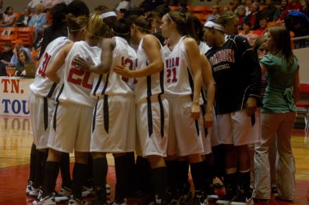 The Lady Bulldogs huddle before their game against Point Loma Nazarene in the NAIA Tournament. - Photo by Angela Abbamonte