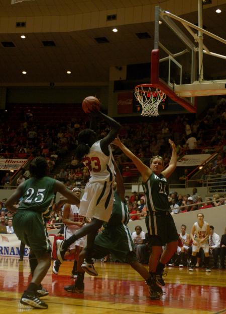 Zeinab Chan takes a shot in the NAIA tournament semifinals against Oklahoma Baptist University. - Photo by Angela Abbamonte