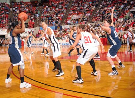 Kaitlin Dudley and Merideth Richardson Jacobs play some tight defense against Lambuth during the NAIA national championship game. - Photo by Morris Abernathy