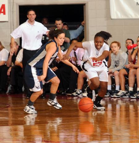 Lavanda Ross makes a run for a loose ball during the first half of the NAIA national championship game. - Photo by Morris Abernathy