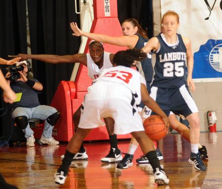 Josephine Owino and Lavanda Ross work the ball inside during the NAIA national championship game. - Photo by Morris Abernathy