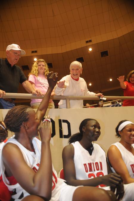 Josephine Owino and Norma Fesmire share a celebratory moment after the Lady Bulldogs' victory over Lambuth in the NAIA national championship. - Photo by Morris Abernathy
