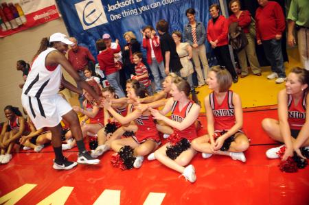 Josephine Owino says thanks to the Union Cheerleaders after the NAIA National Championship victory. - Photo by Morris Abernathy