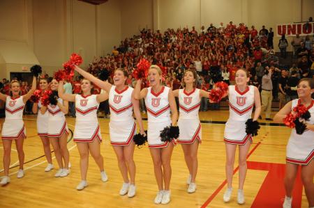 Union cheerleaders lead Union fans in a cheer during the TranSouth Conference Tournament Championship game. - Photo by Morris Abernathy