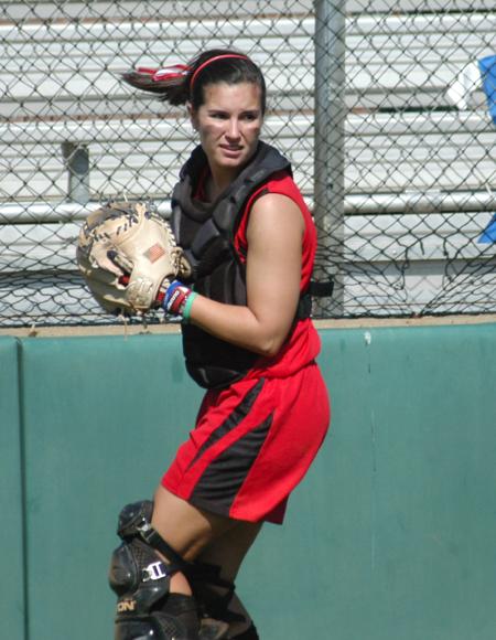 Lindsey Landreneau quickly looks back to the infield after snagging a foul ball for the out. - Photo by Steven Aldridge