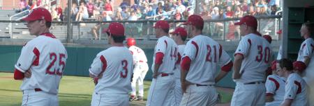 Union players watch as their teammate steps up to bat. - Photo by Steven Aldridge