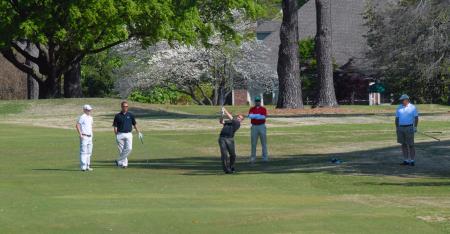 The Horne, LLP team makes their way down the fairway during Union's first Roy L. White Golf & Gala golf tournament. - Photo by Morris Abernathy