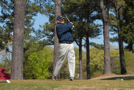 Harry Smith tees off during Union's first Roy L. White Golf & Gala golf tournament. - Photo by Morris Abernathy