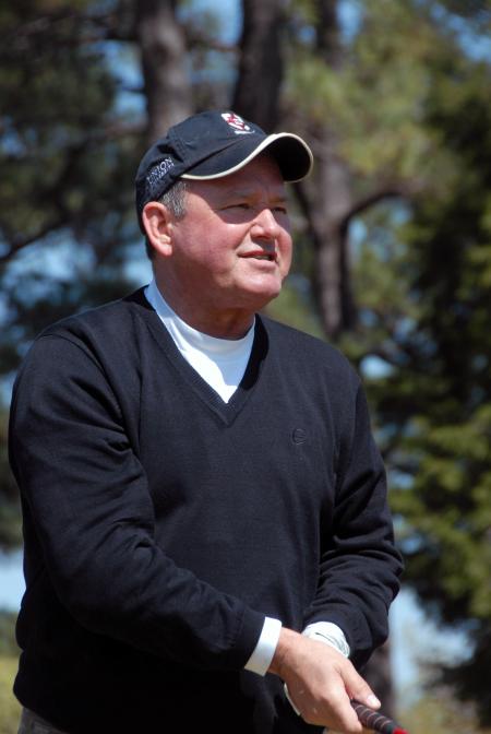Bob Campbell, member of the board of Union's Trustees, follows his ball down the fairway during Union's first Roy L. White Golf & Gala golf tournament. - Photo by Morris Abernathy