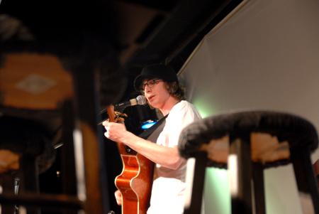 Andrew Norman preforms a song for an open mic night in Barefoots Joe.  - Photo by Kristi McMurry Woody