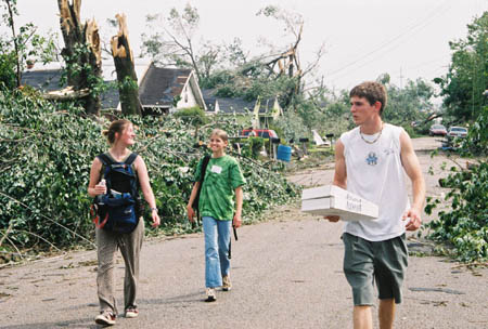 Sophomore Liz Kilby (left) and David Wolk head out to pass out lunches to victims of tornado damage in downtown Jackson.
 - Photo by Justin Veneman