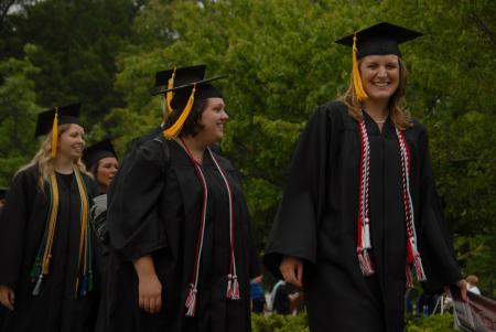 Sarah Conway makes her way to the Great Lawn to receive her Bachelor of Science degree in Chemistry at spring graduation. - Photo by Angela Abbamonte