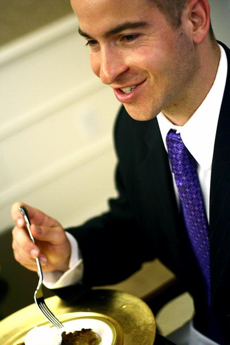 Mark Mogle, senior management major, enjoys the lunch prepared for the 2009 Etiquette Luncheon. At this annual event, First Lady Lanese Dockery and Mrs. Sherry Tignor instruct students on proper interview etiquette. - Photo by Kristi McMurry Woody