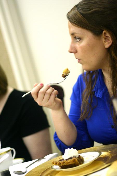 Lydia Marshall, senior Spanish major, enjoys the lunch prepared for the 2009 Etiquette Luncheon. At this annual event, First Lady Lanese Dockery and Mrs. Sherry Tignor instruct students on proper interview etiquette. - Photo by Kristi McMurry Woody