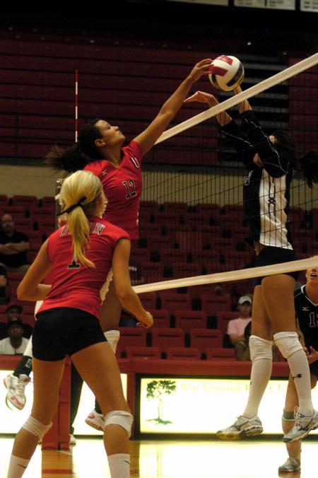 Marcela Madeira jumps for the ball during the women's volleyball game on against Brescia (Ky.). - Photo by Sarah Palmer Goff