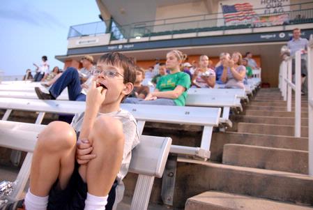 Seth, the son of Chris and Ashley Blair, communication arts professors, enjoys a Diamond Jaxx game on college night. Many Union faculty and students attended for this special night. - Photo by Kristi McMurry Woody