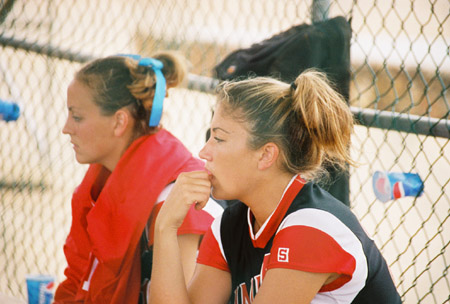 Leah Gronberg (left) and Crystal Surgalski at the 2003 NAIA Softball World Series in Decatur, Ala. versus the University of Mary. - Photo by Steven Aldridge