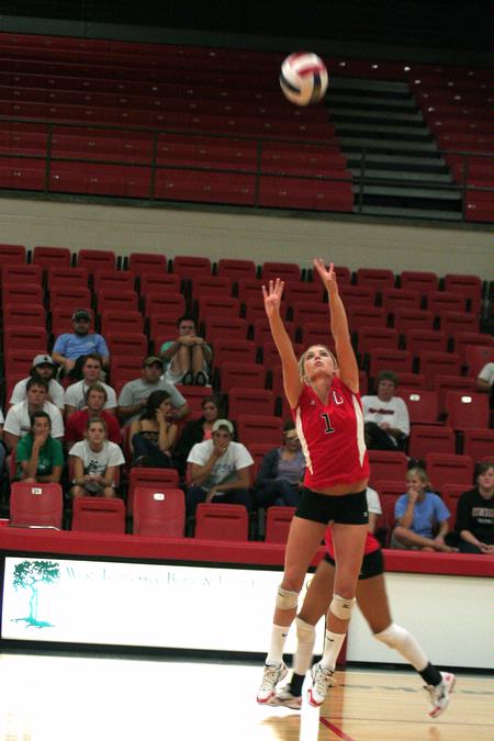 Katie Adams, senior communications major, sets the ball in a match against Martin Methodist. The Lady Bulldogs won 3-0 - Photo by Kristi McMurry Woody