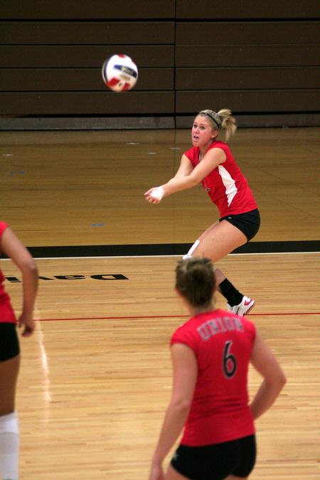 Lauren Sprouse, freshman occupational therapy major, passes the ball during a match against Martin Methodist. The Lady Bulldogs won 3-0. - Photo by Kristi McMurry Woody