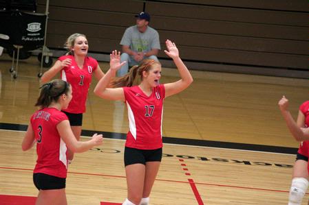 The Lady Bulldog volleyball team celebrates a point in their game against Martin Methodist.  The women won this match 3-0. - Photo by Kristi McMurry Woody